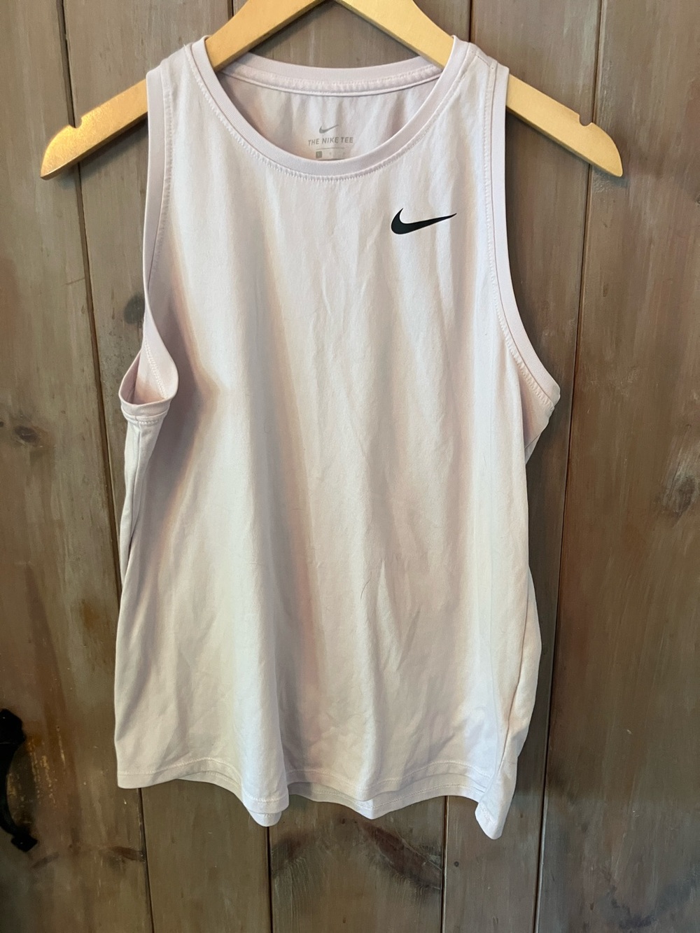 Nike Light Pink Women’s Athletic Tank with Black Swoosh